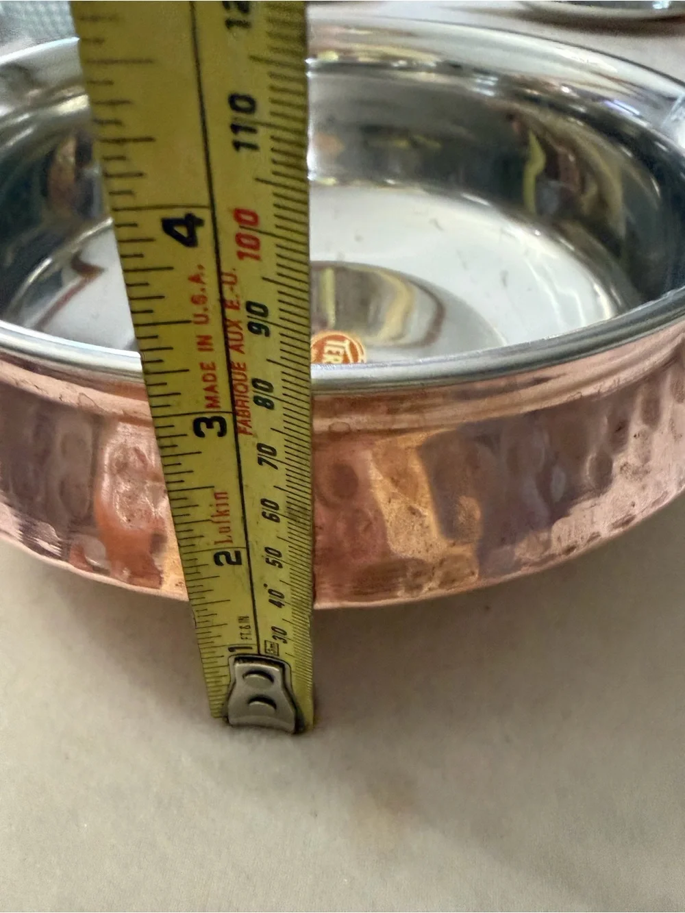 Tera India stainless steel with a hammered copper finish on the exterior
